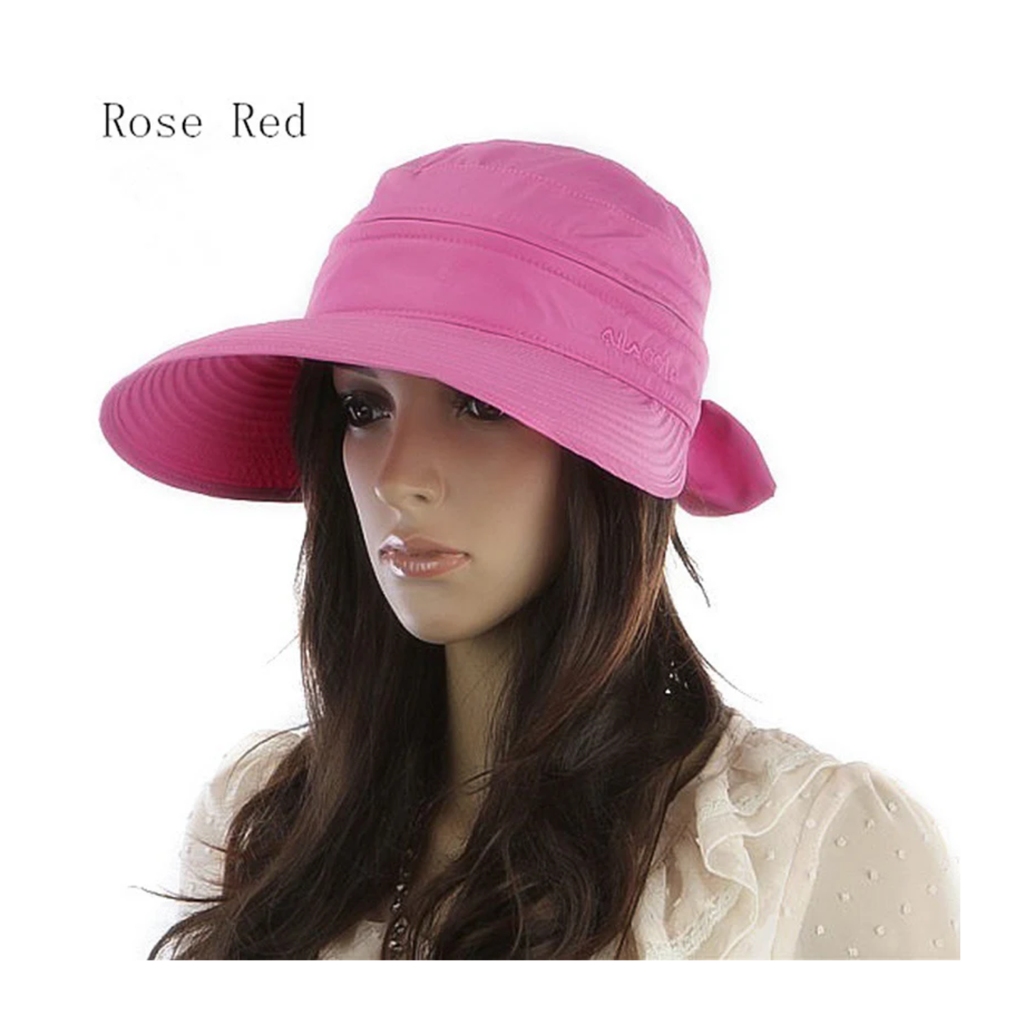 Woman wearing a rose red sun hat.